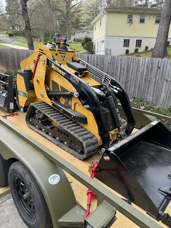 Vermeer S925TX loaded on a trailer